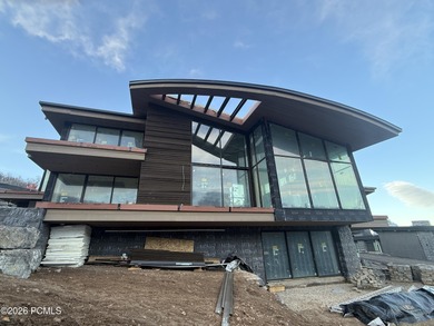 This exquisite ski-in/ski-out masterpiece is nestled in the - photo 10