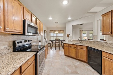 Welcome to lakeside living in the community of Runaway Bay! This - photo 4
