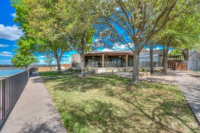 Discover the epitome of waterfront luxury living with this - photo 8