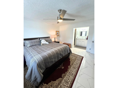 Nestled in the lush, gated Las Vistas community, this corner - photo 14