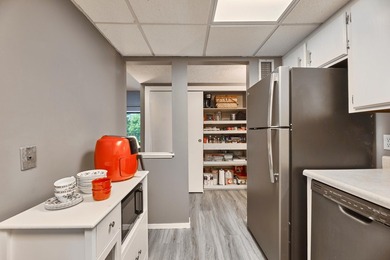 OWN for LESS than Rent! Top-floor living at Lochmoor! Enjoy the - photo 14
