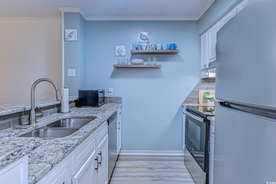 A RARE FIND! This charming, move-in-ready 2-bedroom, 2-bathroom