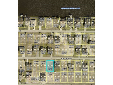 This vacant residential lot, located at 4310 NW 34th Ln in the - photo 1