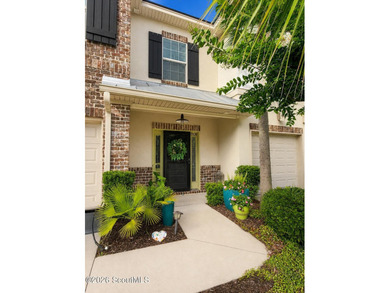 Beautifully maintained FULLY FURNISHED coastal townhome with - photo 2