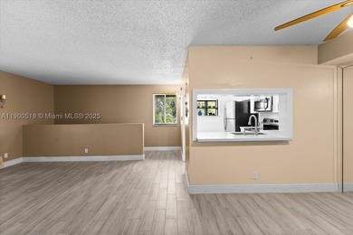 Welcome to this beautifully upgraded corner unit condo in the - photo 4