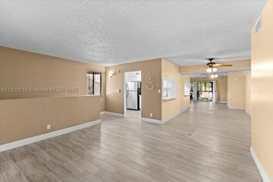 Welcome to this beautifully upgraded corner unit condo in the - photo 6