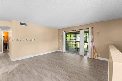 Welcome to this beautifully upgraded corner unit condo in the - photo 9
