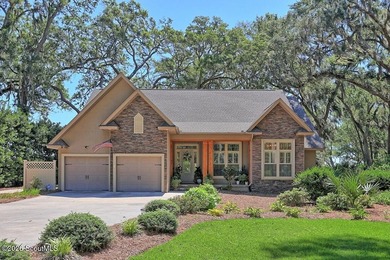 Experience quiet, coastal luxury on .85 acres of waterfront - photo 1