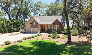 Experience quiet, coastal luxury on .85 acres of waterfront - photo 3