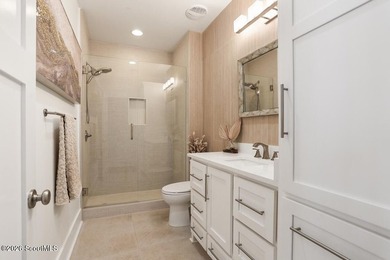 Experience quiet, coastal luxury on .85 acres of waterfront - photo 7