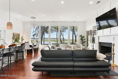 Experience quiet, coastal luxury on .85 acres of waterfront - photo 8