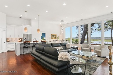 Experience quiet, coastal luxury on .85 acres of waterfront - photo 9