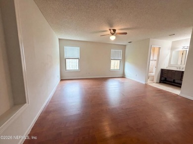A one-story Jacksonville home on a cul-de-sac, featuring four - photo 11