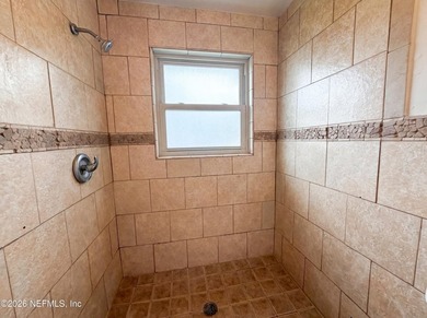 A one-story Jacksonville home on a cul-de-sac, featuring four - photo 12