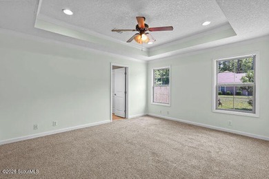 A welcoming three-bedroom, two-bath vinyl-sided home combines - photo 17