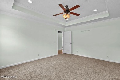 A welcoming three-bedroom, two-bath vinyl-sided home combines - photo 18