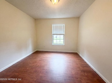 A one-story Jacksonville home on a cul-de-sac, featuring four - photo 18