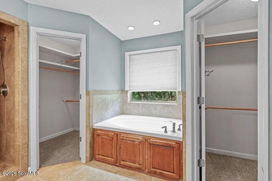 A welcoming three-bedroom, two-bath vinyl-sided home combines - photo 19