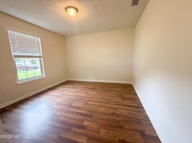 A one-story Jacksonville home on a cul-de-sac, featuring four - photo 19