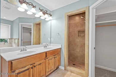 A welcoming three-bedroom, two-bath vinyl-sided home combines - photo 20