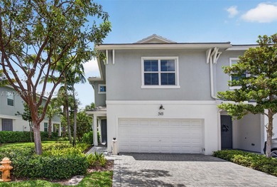 This exceptional corner-unit townhome offers 3 bedrooms, 2 full - photo 1