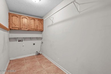 A welcoming three-bedroom, two-bath vinyl-sided home combines - photo 23