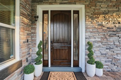 From the moment you arrive, this Mediterranean home in the - photo 3