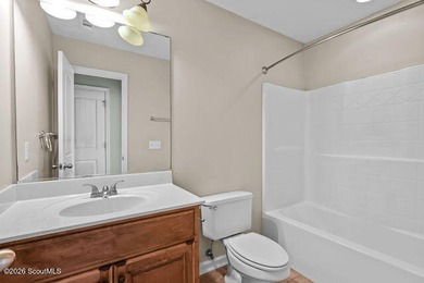 A welcoming three-bedroom, two-bath vinyl-sided home combines - photo 24