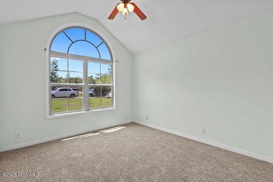 A welcoming three-bedroom, two-bath vinyl-sided home combines - photo 25