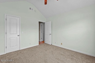 A welcoming three-bedroom, two-bath vinyl-sided home combines - photo 26