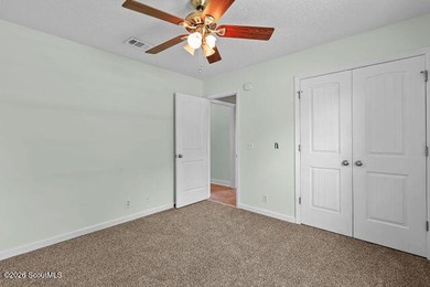 A welcoming three-bedroom, two-bath vinyl-sided home combines - photo 28