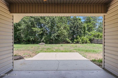 A welcoming three-bedroom, two-bath vinyl-sided home combines - photo 29