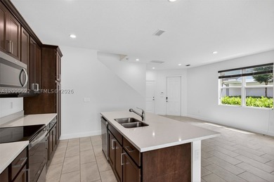This exceptional corner-unit townhome offers 3 bedrooms, 2 full - photo 9