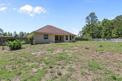 A welcoming three-bedroom, two-bath vinyl-sided home combines - photo 30