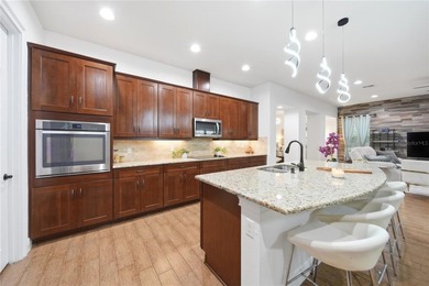 From the moment you arrive, this Mediterranean home in the - photo 10