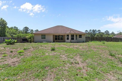A welcoming three-bedroom, two-bath vinyl-sided home combines - photo 31
