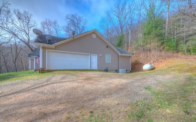 Located on 5.73 acres of UNRESTRICTED wooded land, this - photo 8