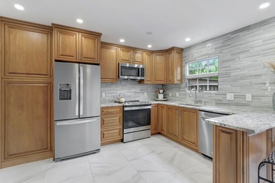 Envision residing just steps away from the serene beachfront of - photo 3