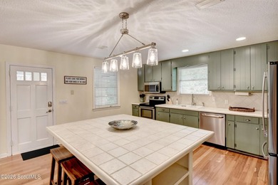 Ideally located on the south end of St. Simons Island, this - photo 2