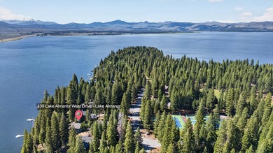Discover the warmth and charm of this lakefront retreat in the - photo 2