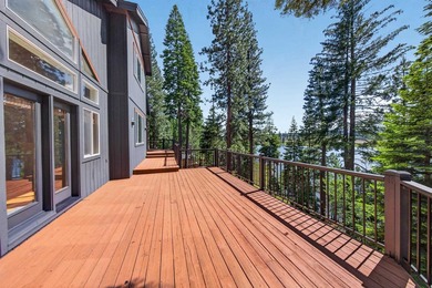 Discover the warmth and charm of this lakefront retreat in the - photo 5