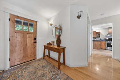 Discover the warmth and charm of this lakefront retreat in the - photo 9