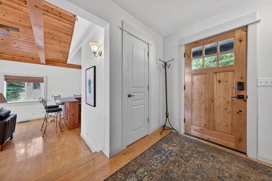 Discover the warmth and charm of this lakefront retreat in the - photo 10