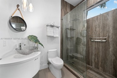 This exceptional waterfront residence is where modern design - photo 14