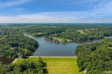 This property is right on the lake, offering nearly an acre of - photo 4