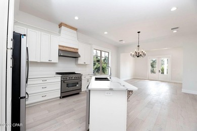 LOWEST PRICED PER SQUARE FOOT CUSTOM HOME IN SANCTUARY BEACH! - photo 6