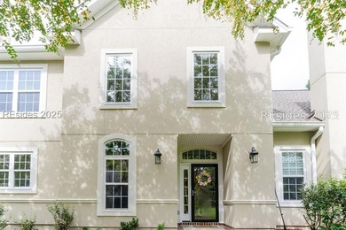 This stunning, end-unit townhome features a grand two-story - photo 2