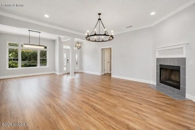Welcome home to this beautifully designed 4-bedroom, 2.5-bath - photo 3