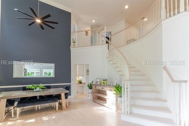 This stunning, end-unit townhome features a grand two-story - photo 4