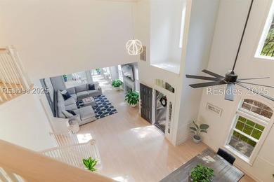 This stunning, end-unit townhome features a grand two-story - photo 5